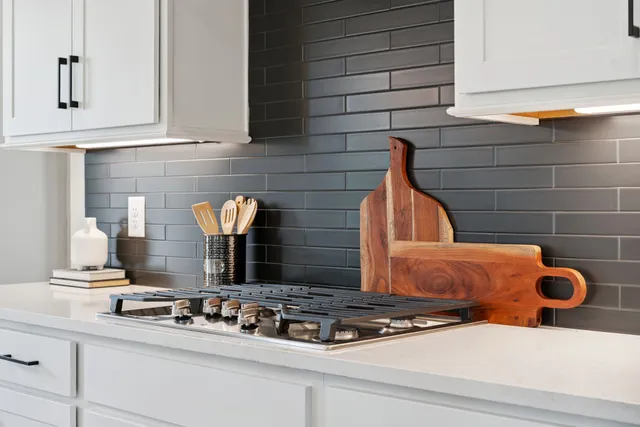 a bathroom with a toilet a sink and a mirror