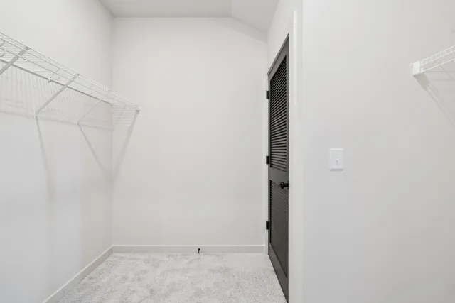 a view of a wooden door of the house