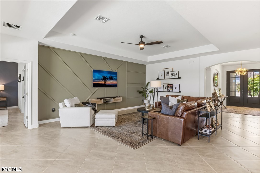 17290 Walnut Run Drive Alva, FL 33920 - Photo 3 of 37 a living room with furniture and a flat screen tv