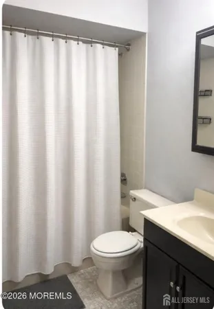 a bathroom with a sink and a toilet