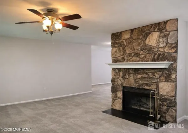 a living room with a fireplace