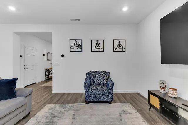 a living room with furniture and a couch