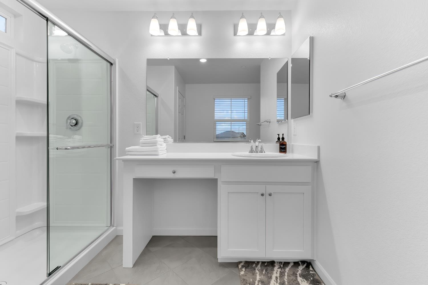 3600 Pride Way Stockton, CA 95212 - Photo 28 of 50 a bathroom with a sink double vanity and a mirror