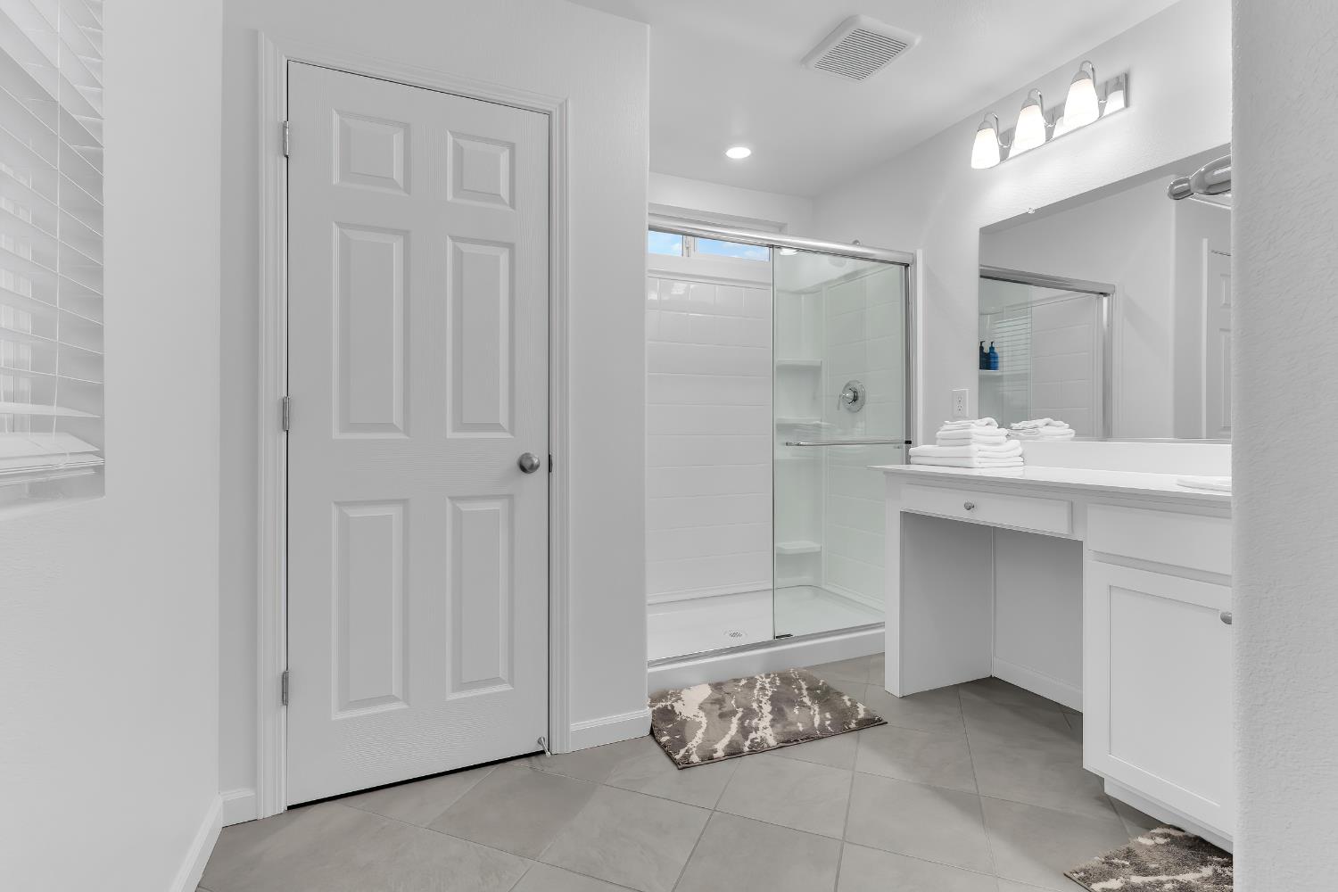 3600 Pride Way Stockton, CA 95212 - Photo 29 of 50 a bathroom with a sink and a mirror