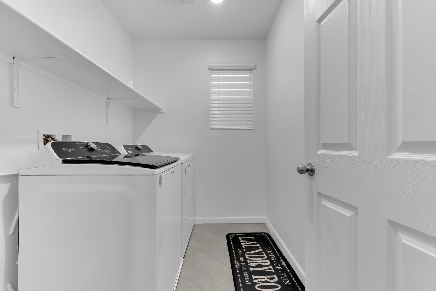 3600 Pride Way Stockton, CA 95212 - Photo 32 of 50 a view of kitchen with sink and washing machine