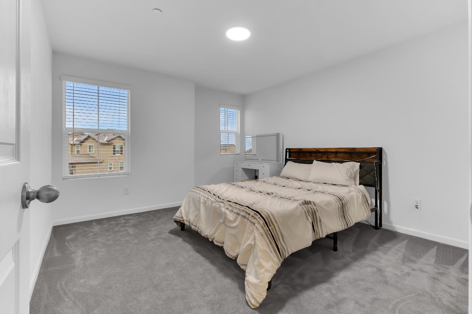 3600 Pride Way Stockton, CA 95212 - Photo 33 of 50 a bedroom with a bed and a painting on the wall