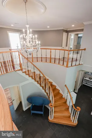 a view of a house with backyard sitting area and garden