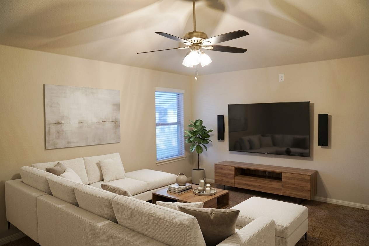 19028 Quebrada Drive Pflugerville, TX 78660 - Photo 22 of 36 a living room with furniture and a flat screen tv