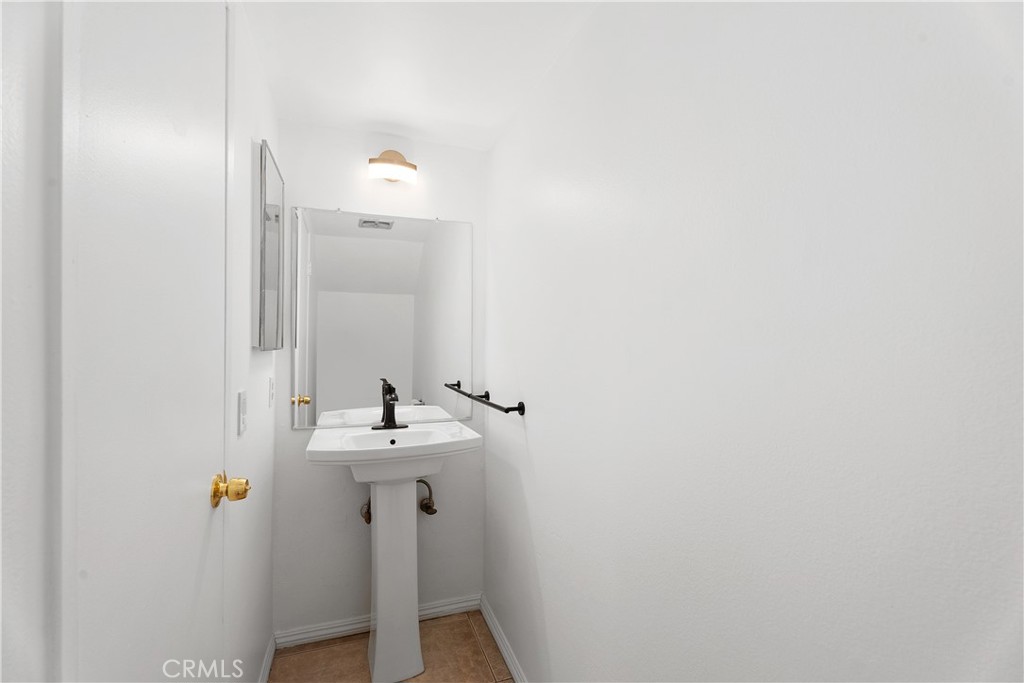 1381 South Walnut Street, Unit 2101 Anaheim, CA 92802 - Photo 10 of 29 Downstairs half bathroom