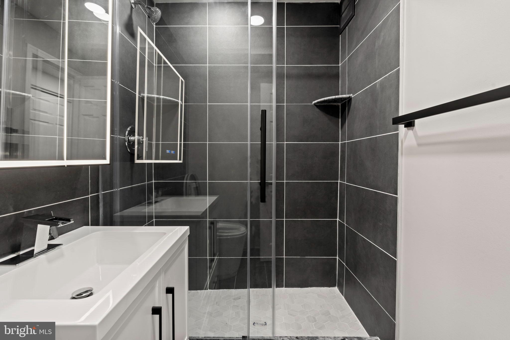 1600 Hagys Ford Road, Unit 3Y Narberth, PA 19072 - Photo 13 of 38 a bathroom with a sink toilet and shower