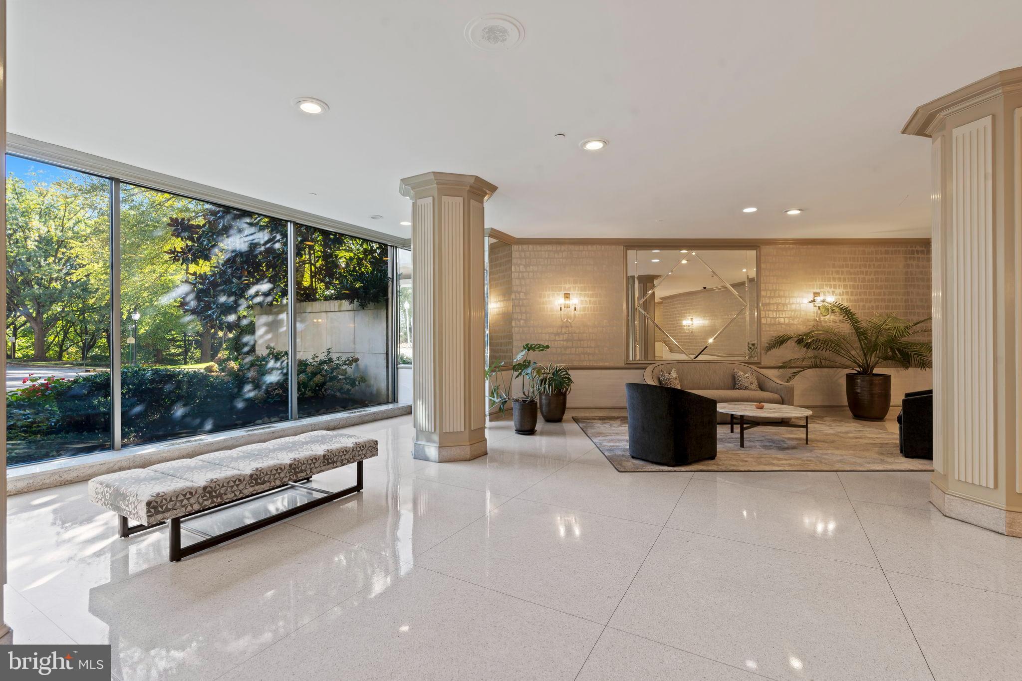 1600 Hagys Ford Road, Unit 3Y Narberth, PA 19072 - Photo 23 of 38 a lobby with furniture and floor to ceiling window