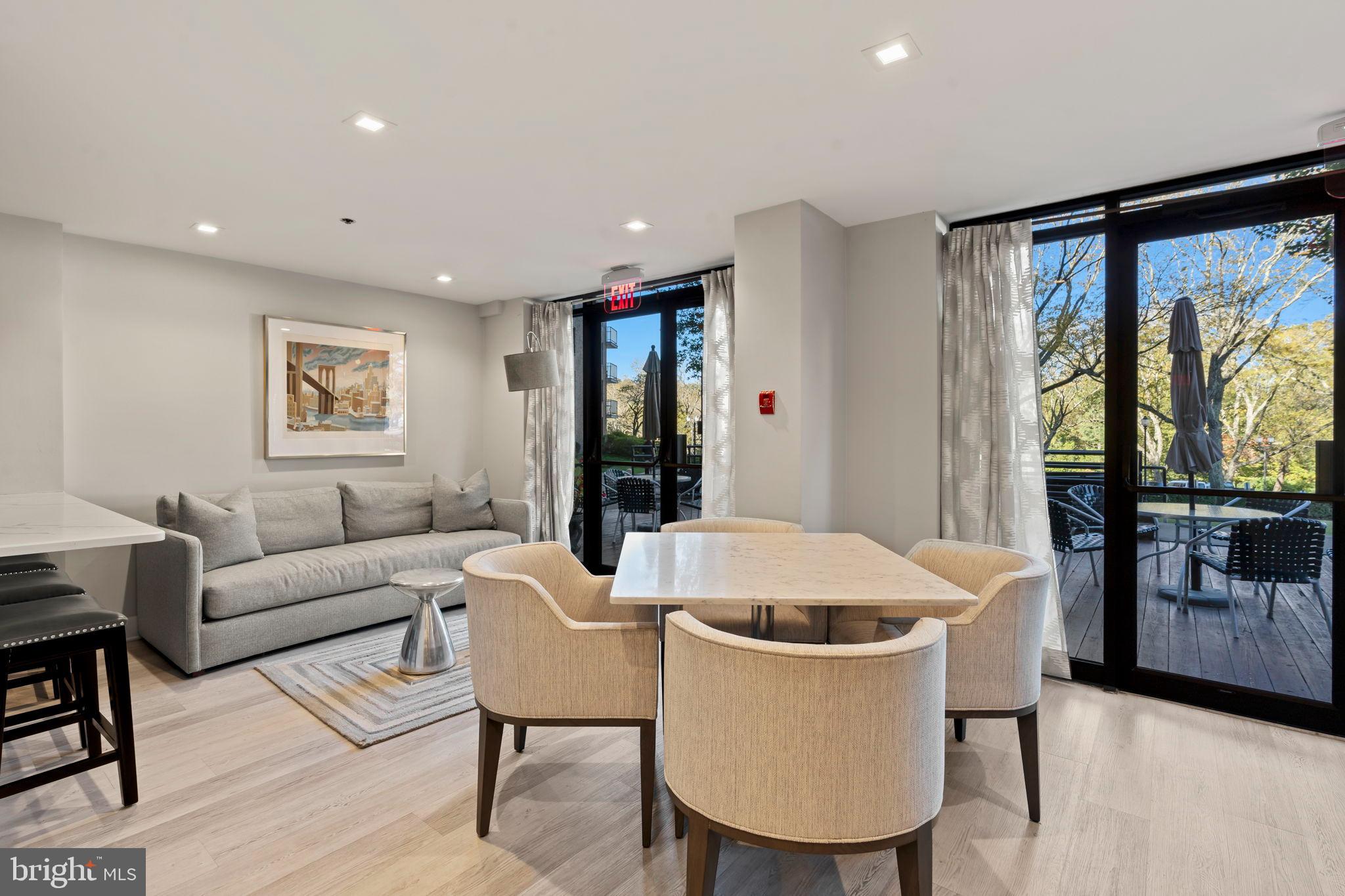 1600 Hagys Ford Road, Unit 3Y Narberth, PA 19072 - Photo 25 of 38 a living room with furniture and a large window