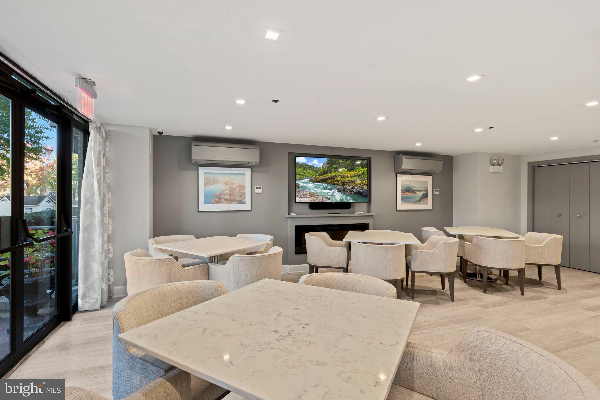 1600 Hagys Ford Road, Unit 3Y Narberth, PA 19072 - Photo 28 of 38 a living room with couches and a flat screen tv