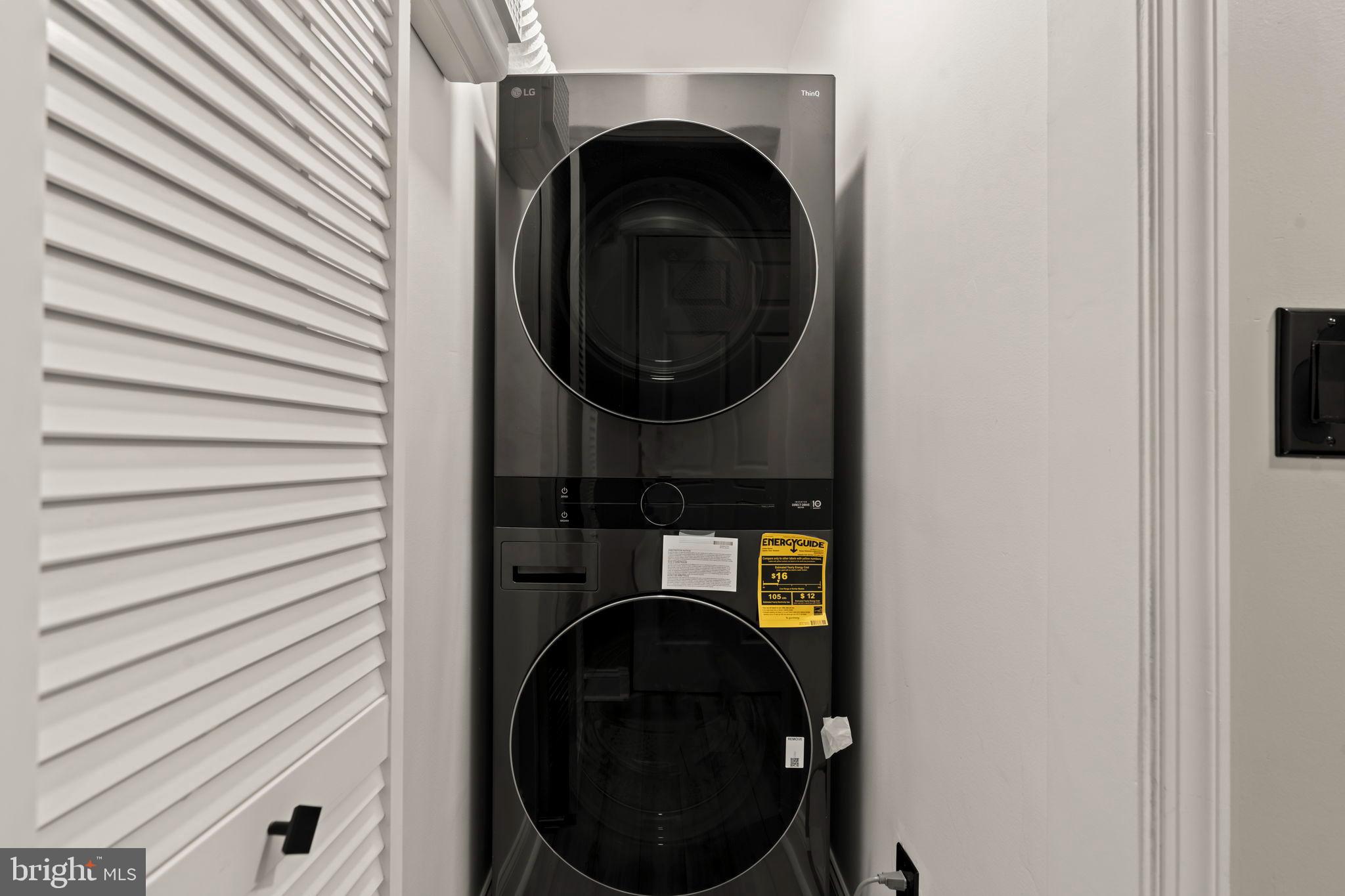 1600 Hagys Ford Road, Unit 3Y Narberth, PA 19072 - Photo 10 of 38 a close view of a utility room with dryer and washer