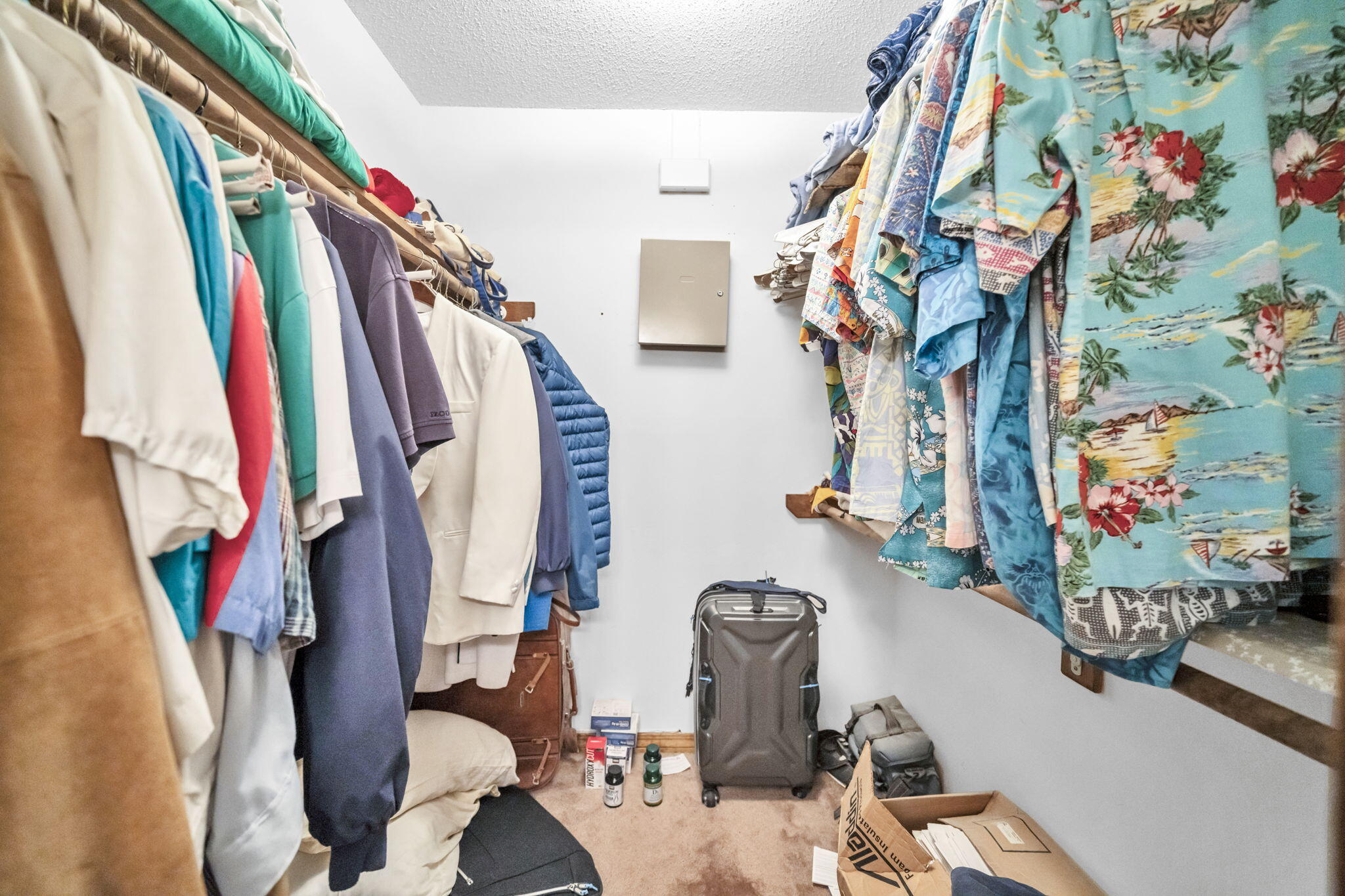 392 Evergreen Circle Destin, FL 32541 - Photo 15 of 32 a view of walk in closet with clothes and shoes