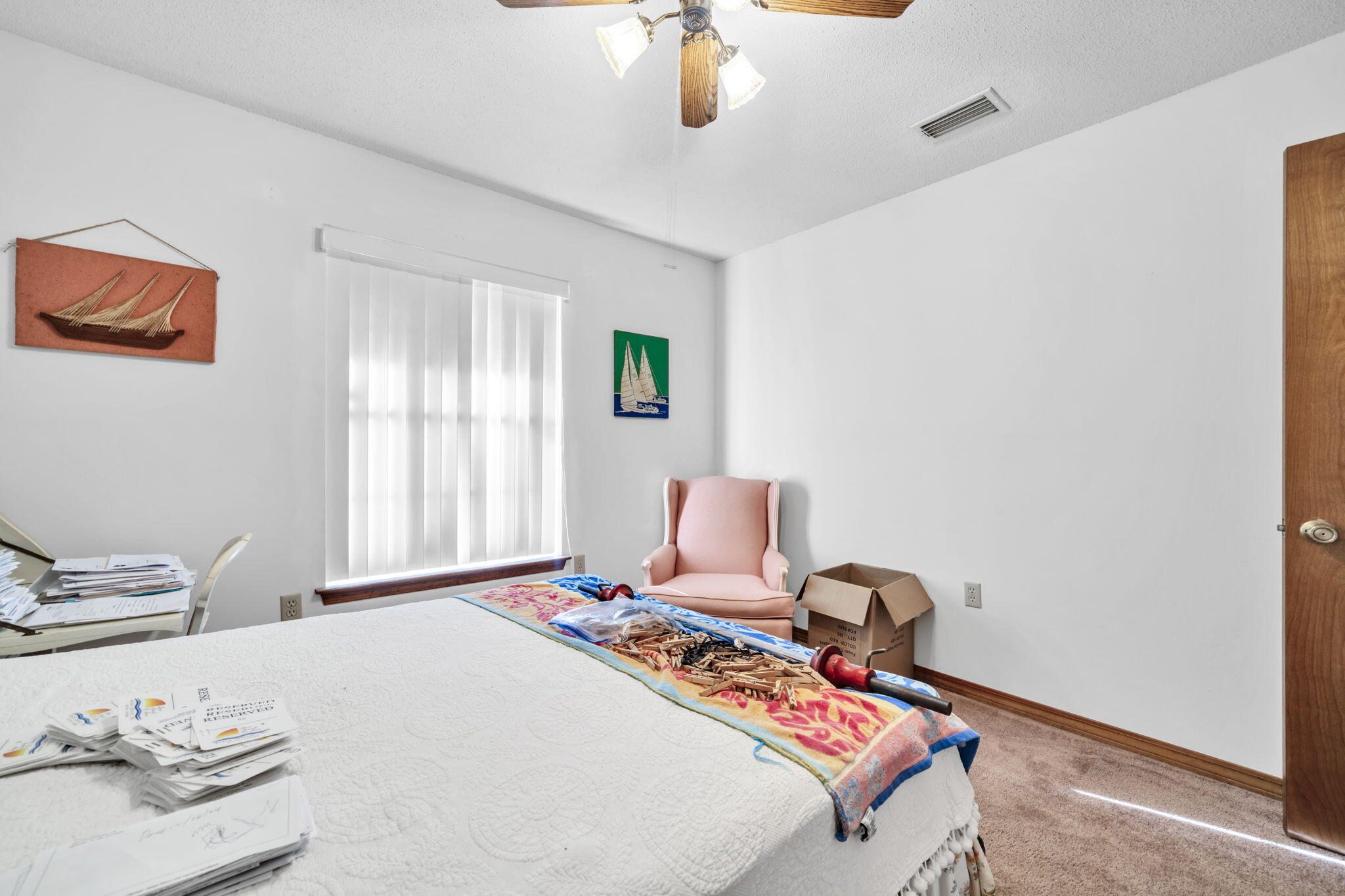 392 Evergreen Circle Destin, FL 32541 - Photo 18 of 32 a bed room with a bed and a window