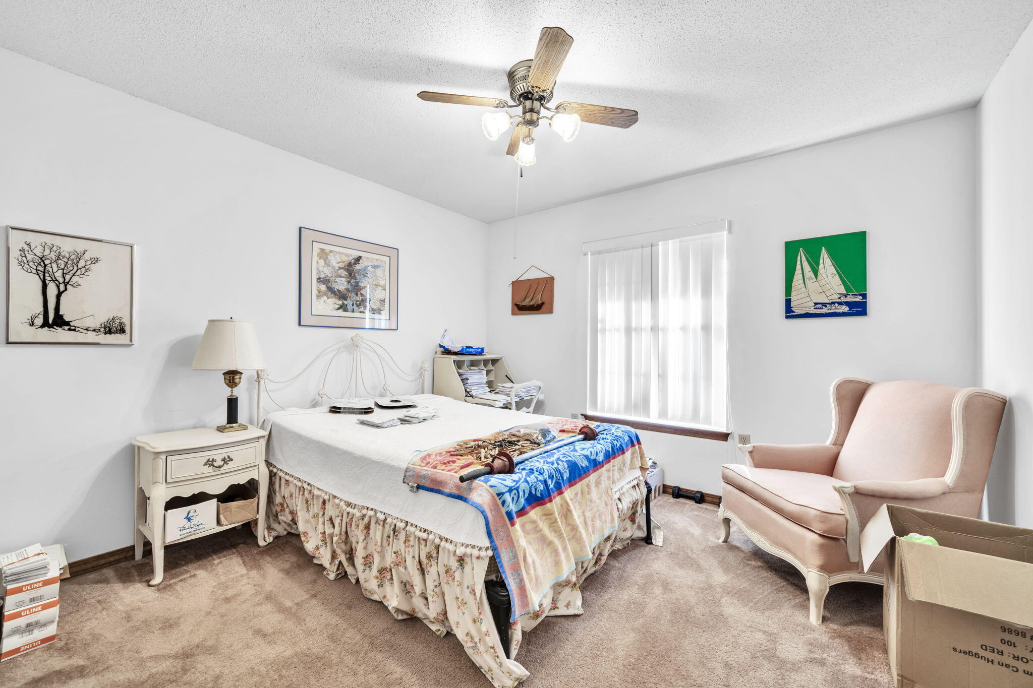 392 Evergreen Circle Destin, FL 32541 - Photo 19 of 32 a bedroom that has a bed and a table in it