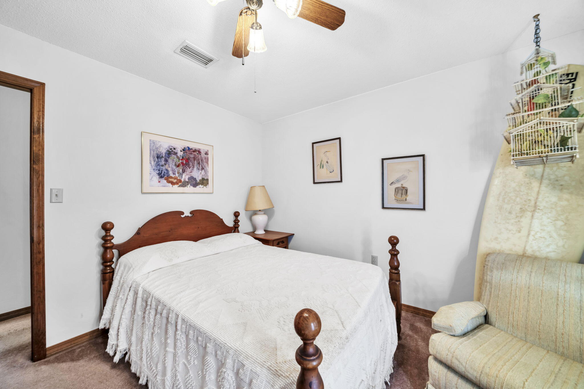 392 Evergreen Circle Destin, FL 32541 - Photo 21 of 32 a bedroom with a bed and a couch