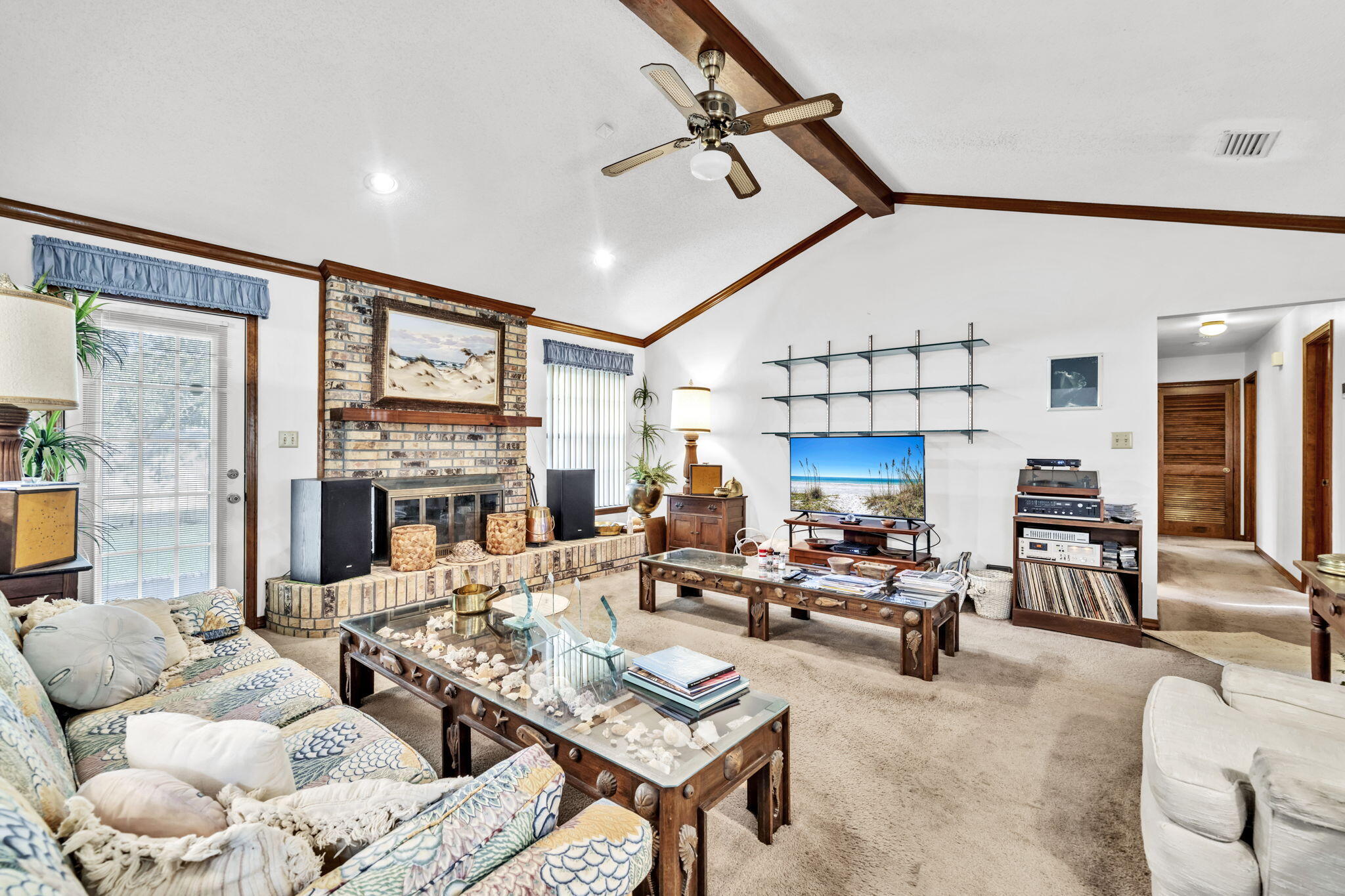 392 Evergreen Circle Destin, FL 32541 - Photo 24 of 32 a living room with fireplace furniture and a large window