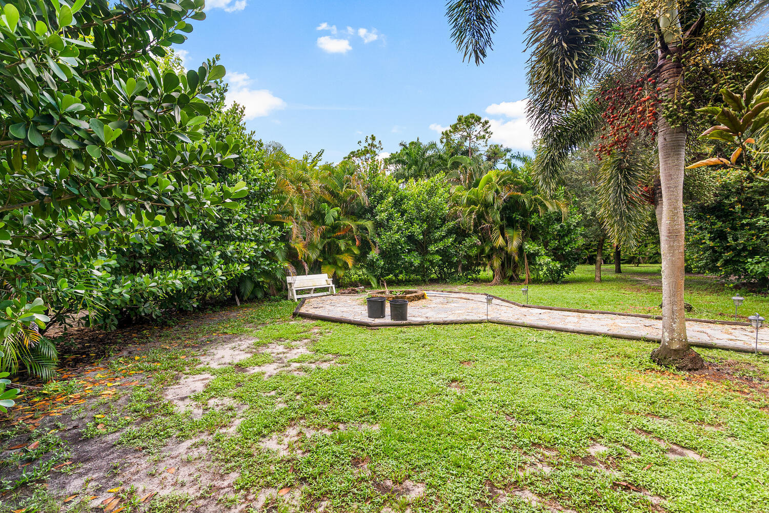 17100 78th Road North Loxahatchee, FL 33470 - Photo 21 of 26 Fire pit