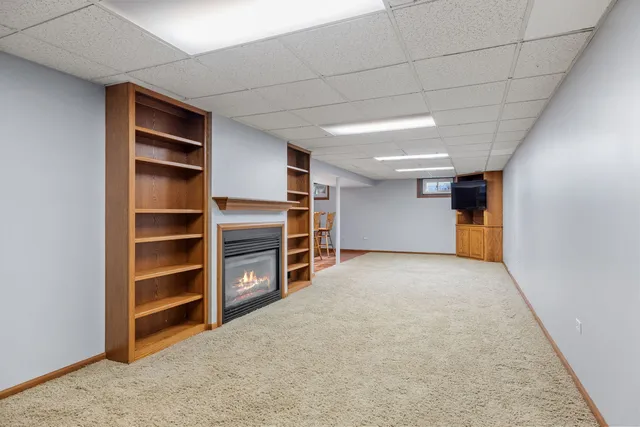 a view of an empty room with a closet