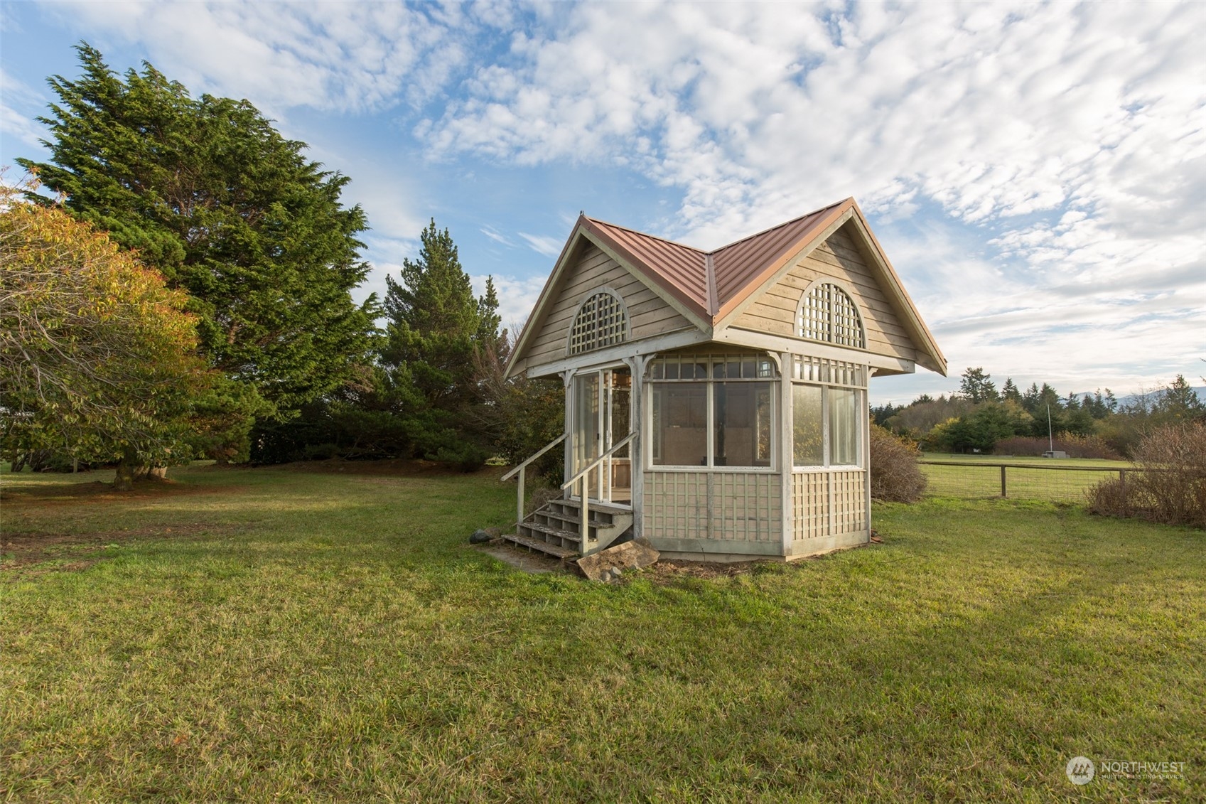 193 Mariners Point Road Sequim, WA 98382 - Photo 24 of 36 a front view of a house with garden