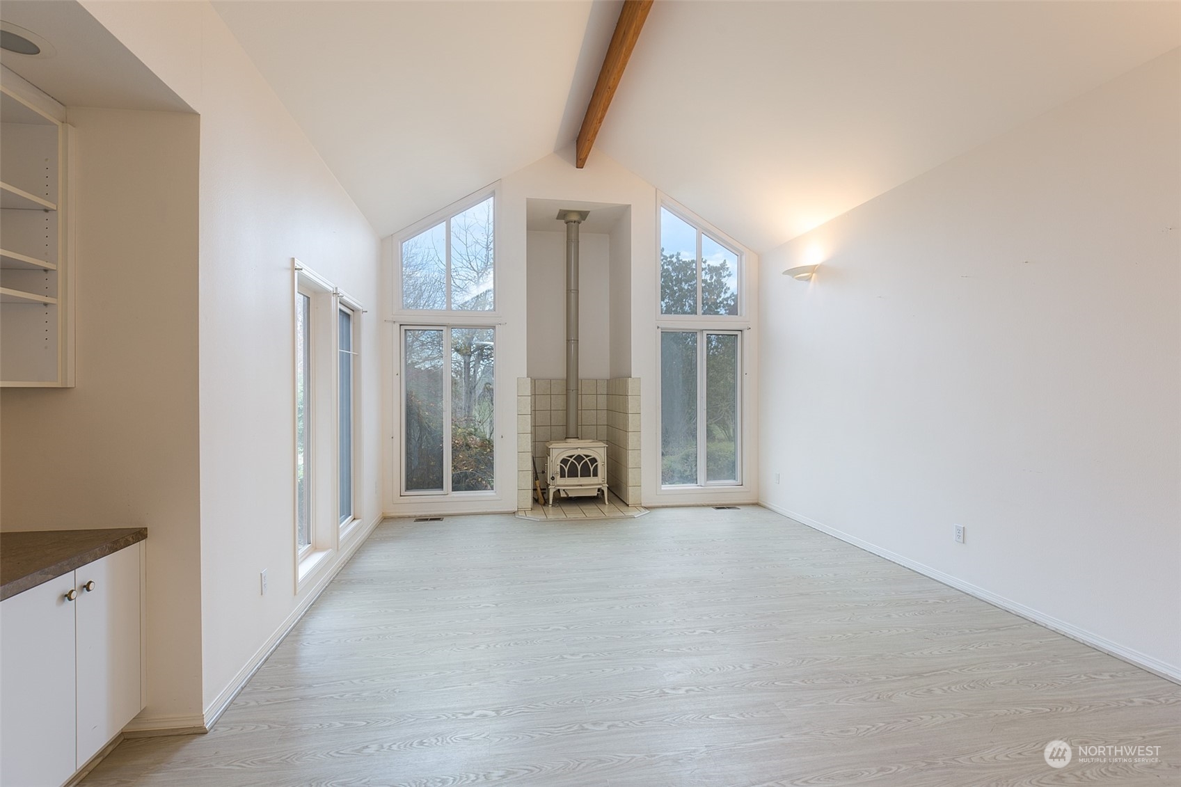 193 Mariners Point Road Sequim, WA 98382 - Photo 8 of 36 an empty room with windows and entrance