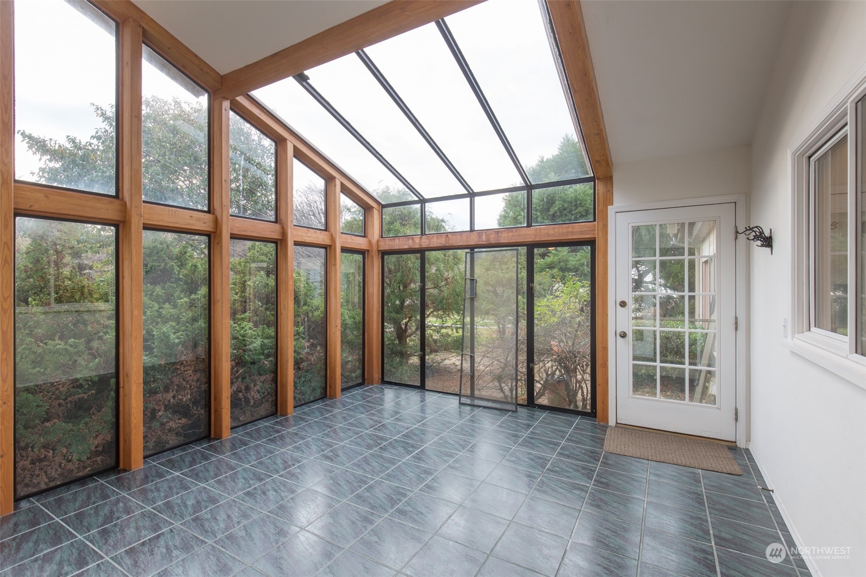 193 Mariners Point Road Sequim, WA 98382 - Photo 9 of 36 an empty room with large windows