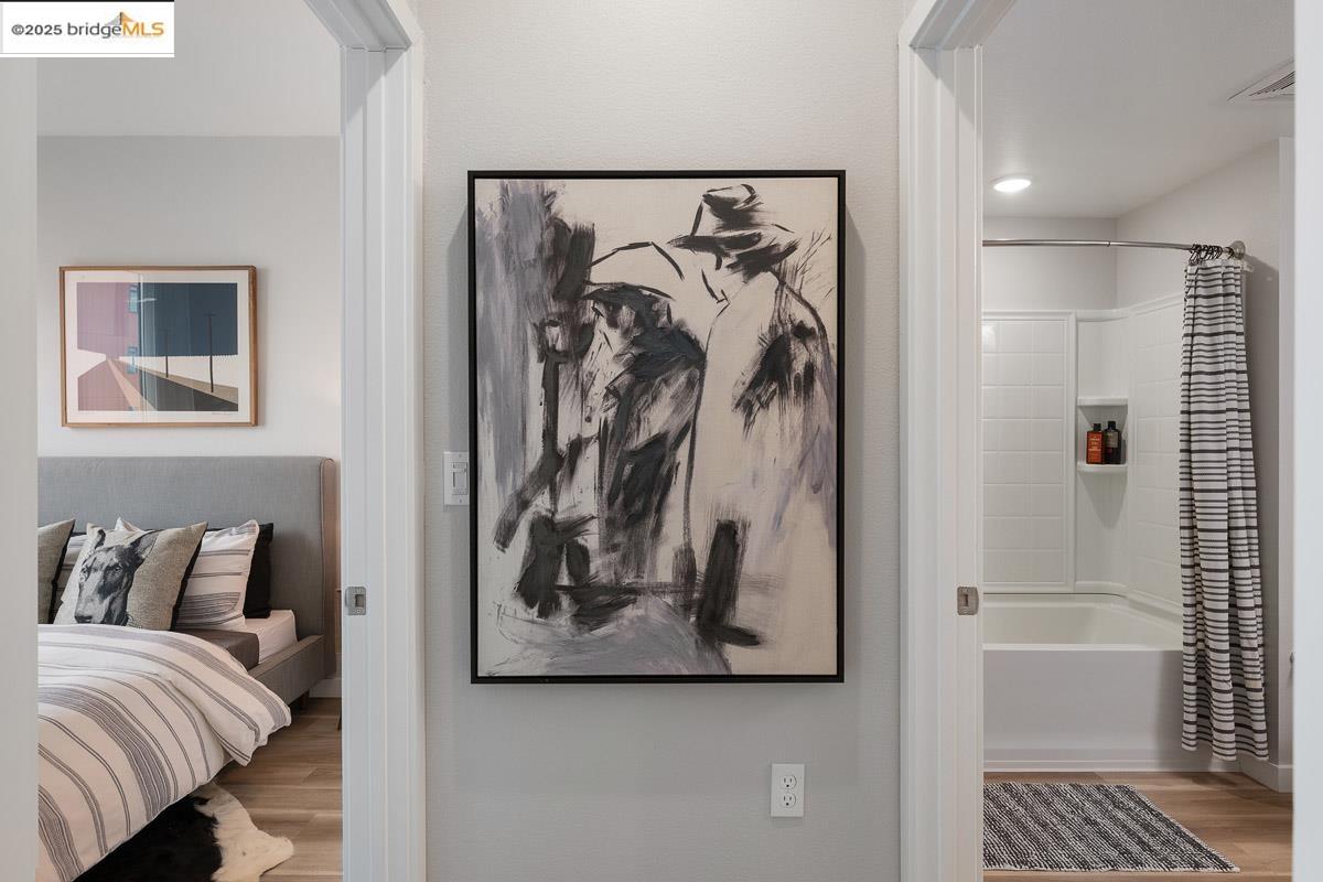 260 Brooklyn Basin Way, Unit 428 Oakland, CA 94606 - Photo 19 of 44 Bedroom with wood finished floors