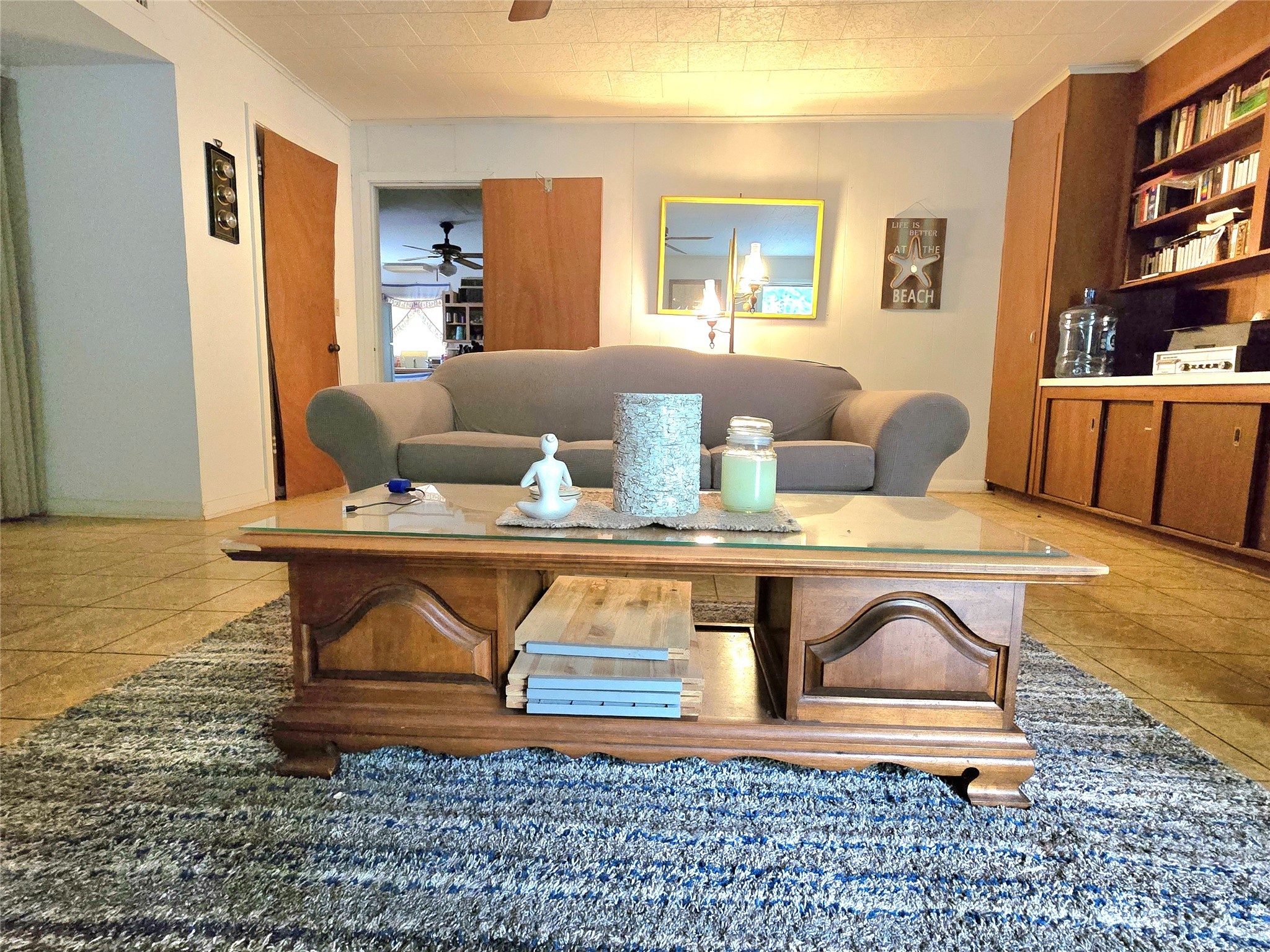 81 Bishop Street Point Blank, TX 77364 - Photo 12 of 22 a living room with furniture and a table