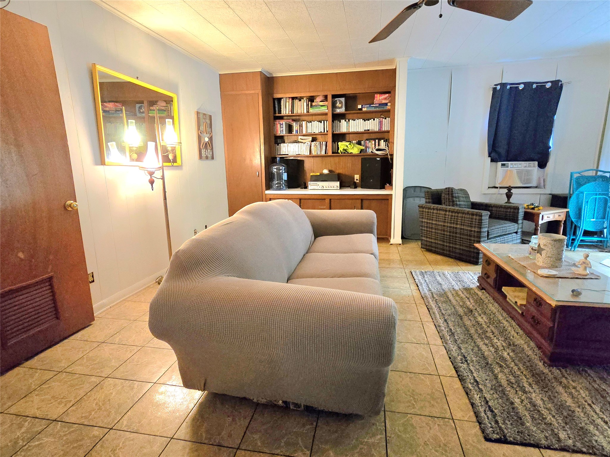 81 Bishop Street Point Blank, TX 77364 - Photo 14 of 22 a living room with furniture and a window