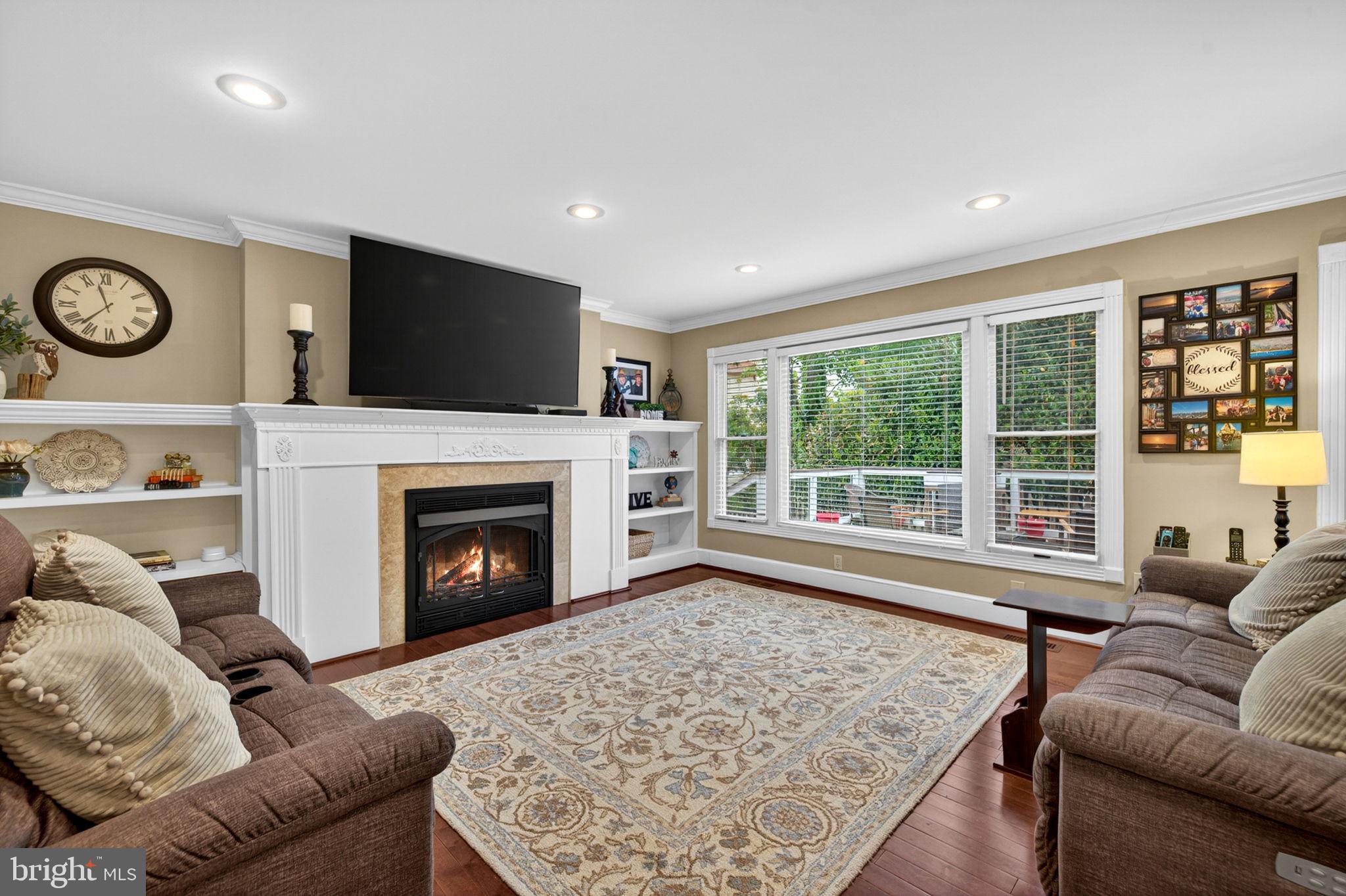 63 Rutherford Circle Sterling, VA 20165 - Photo 22 of 52 Family Room with updated mantle & built insWa