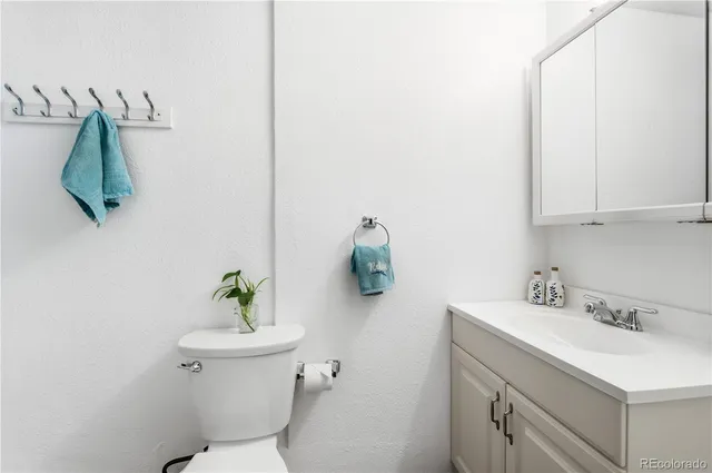 a view of room with hardwood wall and painting on the wall