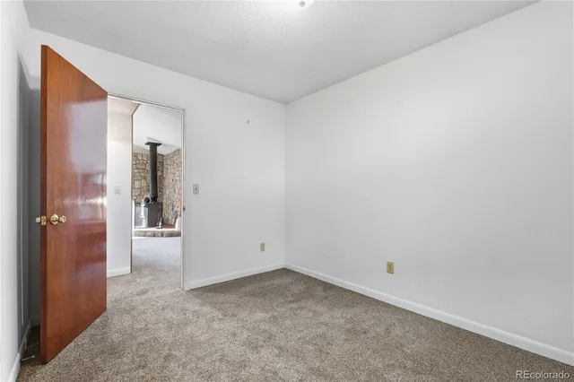 a view of livingroom with furniture and windows