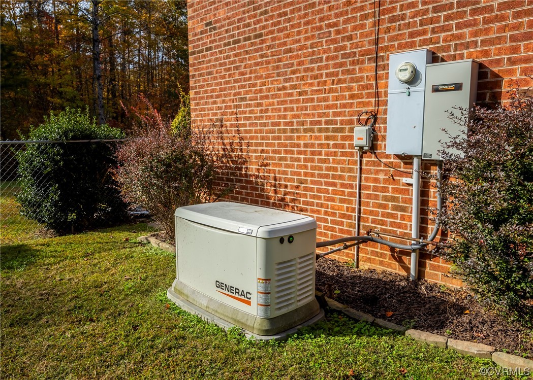 175 Walton Road Keysville, VA 23947 - Photo 13 of 49 a utility room with a stove and a tree