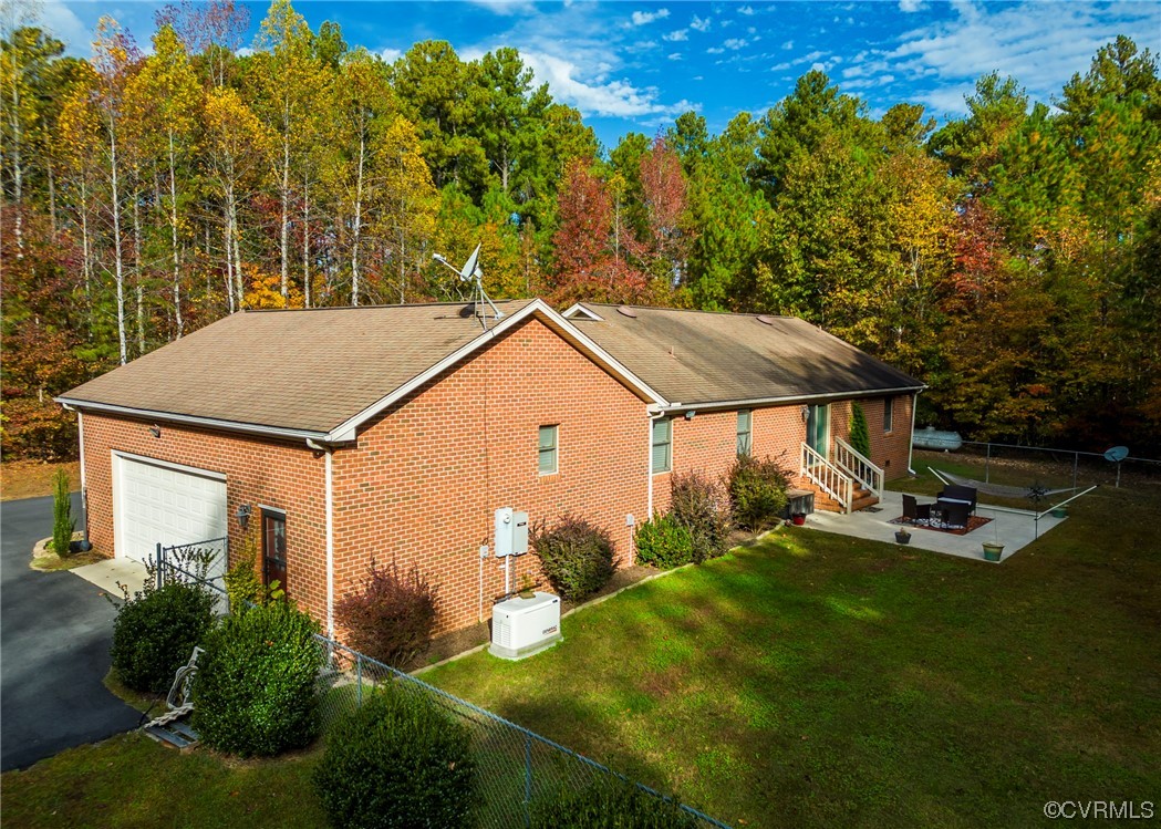 175 Walton Road Keysville, VA 23947 - Photo 15 of 49 a view of a house with backyard and sitting area