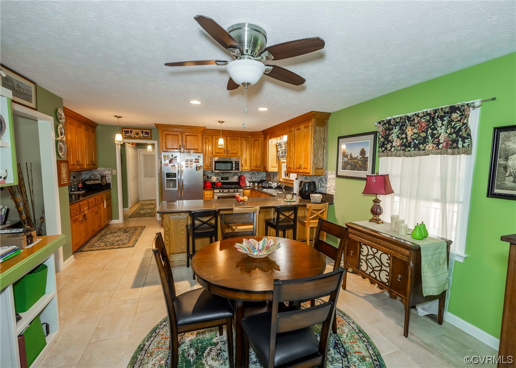 175 Walton Road Keysville, VA 23947 - Photo 32 of 49 a view of a dining room with furniture