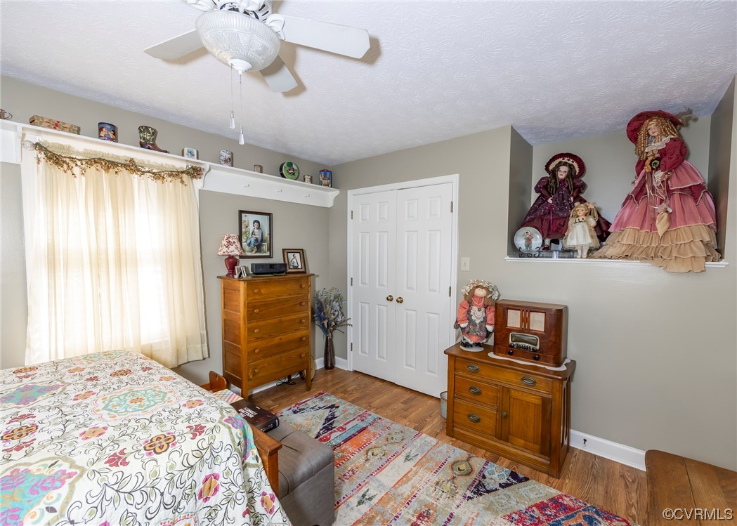 175 Walton Road Keysville, VA 23947 - Photo 38 of 49 a bedroom with a bed and cabinets