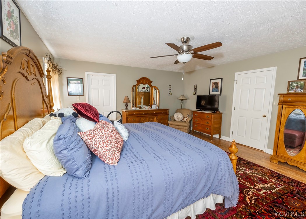 175 Walton Road Keysville, VA 23947 - Photo 44 of 49 a bed room with a bed and dresser