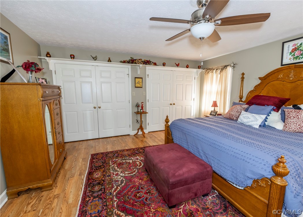 175 Walton Road Keysville, VA 23947 - Photo 46 of 49 a bedroom with bed and wooden floor