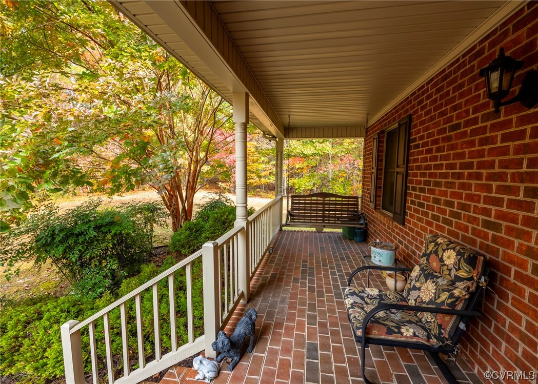 175 Walton Road Keysville, VA 23947 - Photo 6 of 49 a view of balcony with wooden floor
