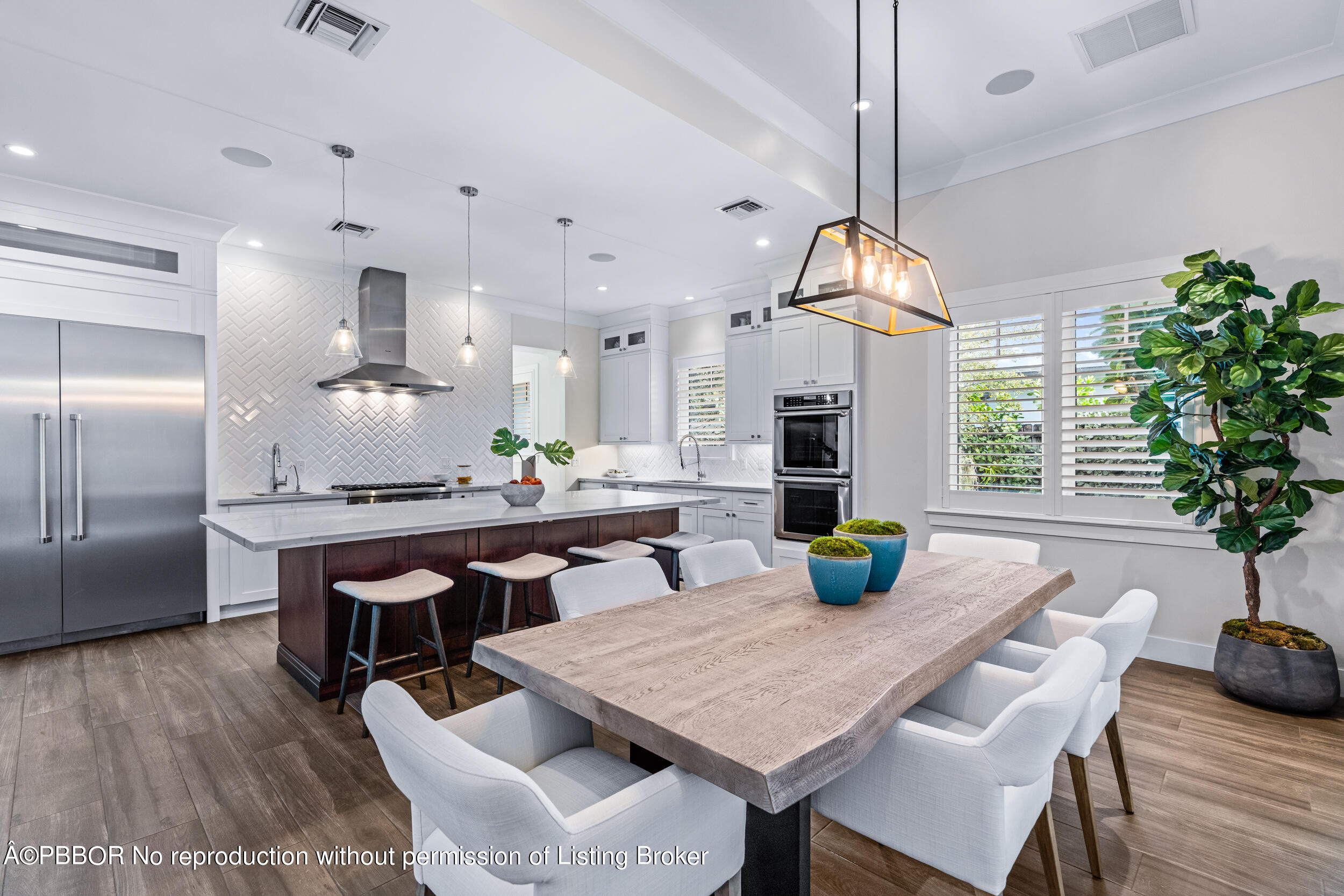 234 Desota Road West Palm Beach, FL 33405 - Photo 12 of 36 a kitchen with a table and chairs in it