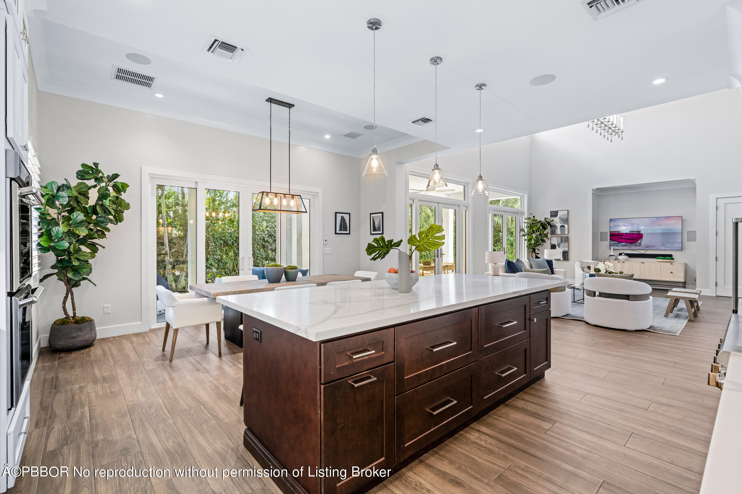 234 Desota Road West Palm Beach, FL 33405 - Photo 15 of 36 a room with a table potted plant and a large window