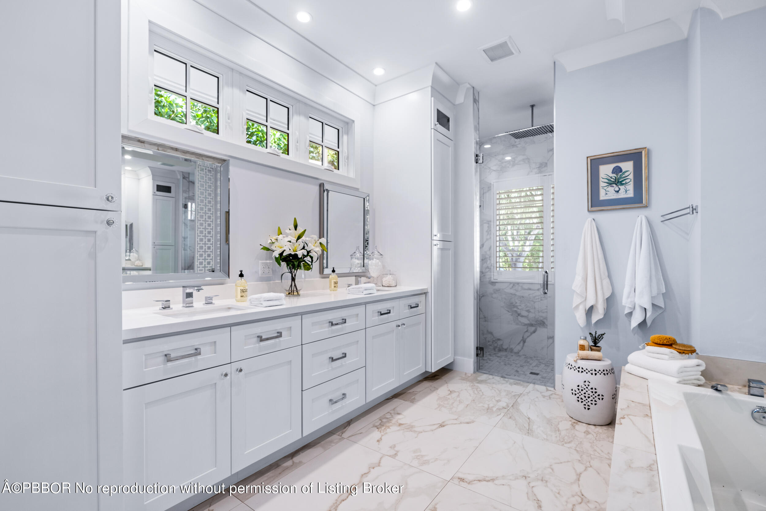 234 Desota Road West Palm Beach, FL 33405 - Photo 18 of 36 a bathroom with a double vanity sink a toilet a shower and a mirror