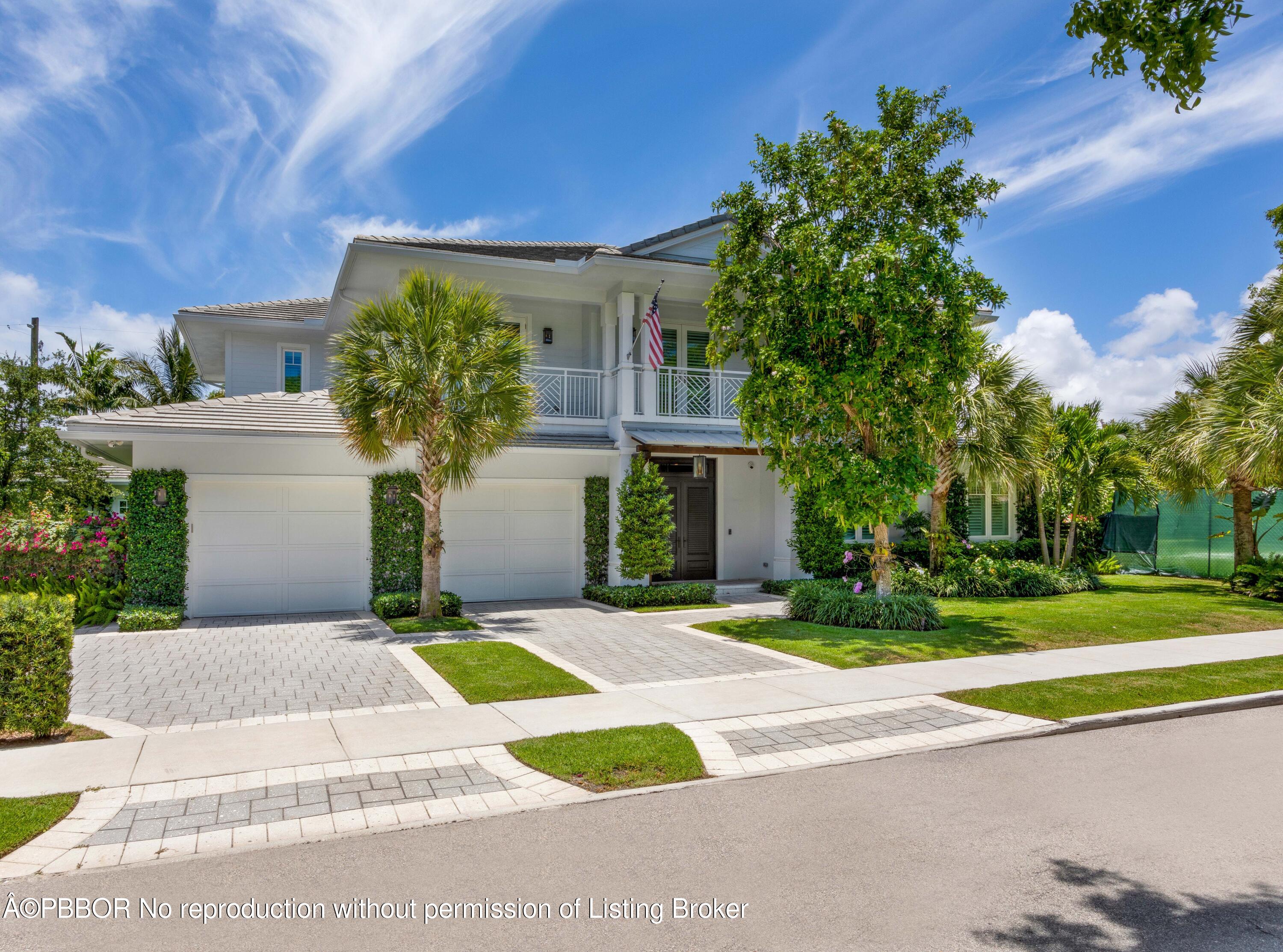 234 Desota Road West Palm Beach, FL 33405 - Photo 2 of 36 a front view of a house with a garden and plants