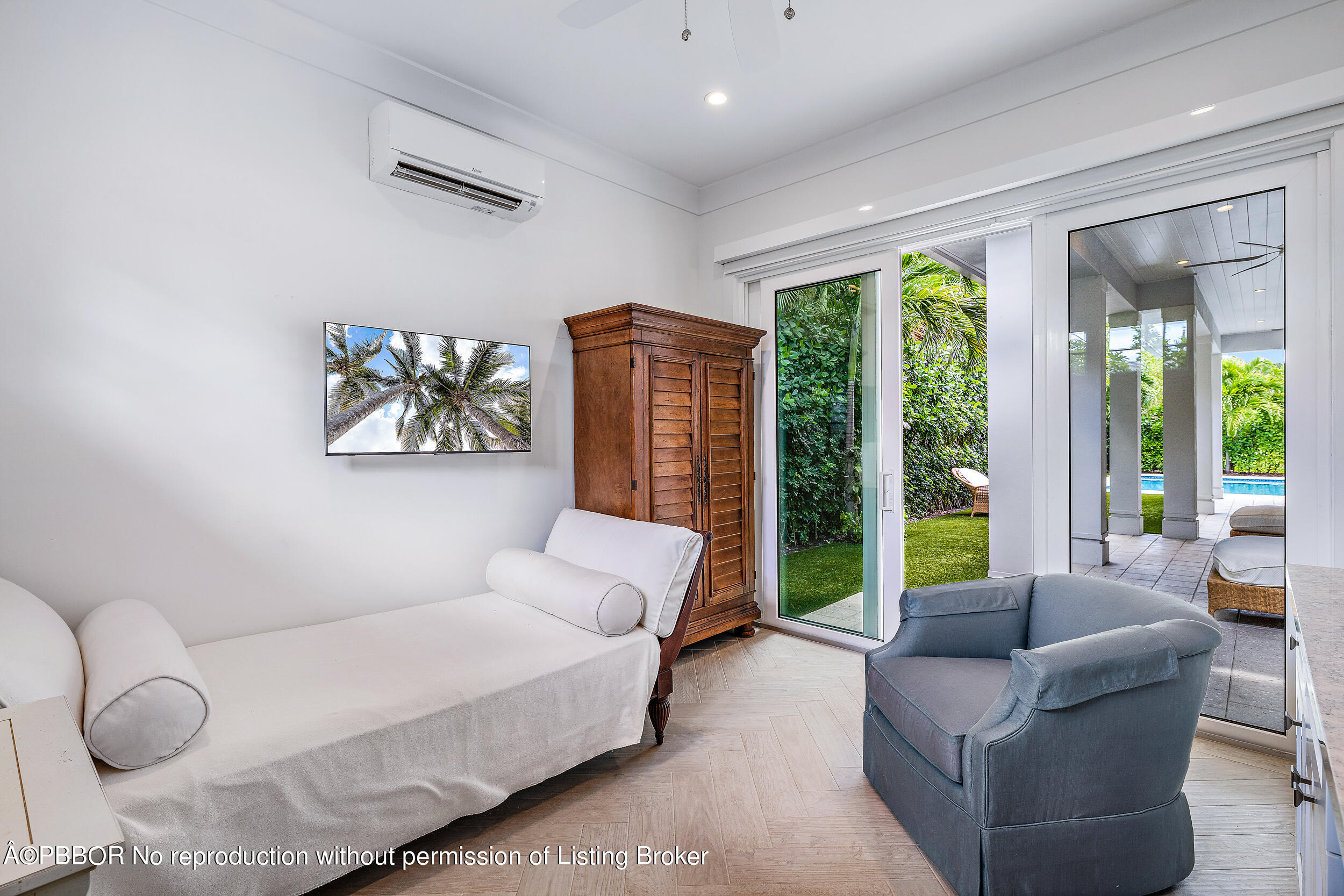 234 Desota Road West Palm Beach, FL 33405 - Photo 29 of 36 a bedroom with furniture and a large window