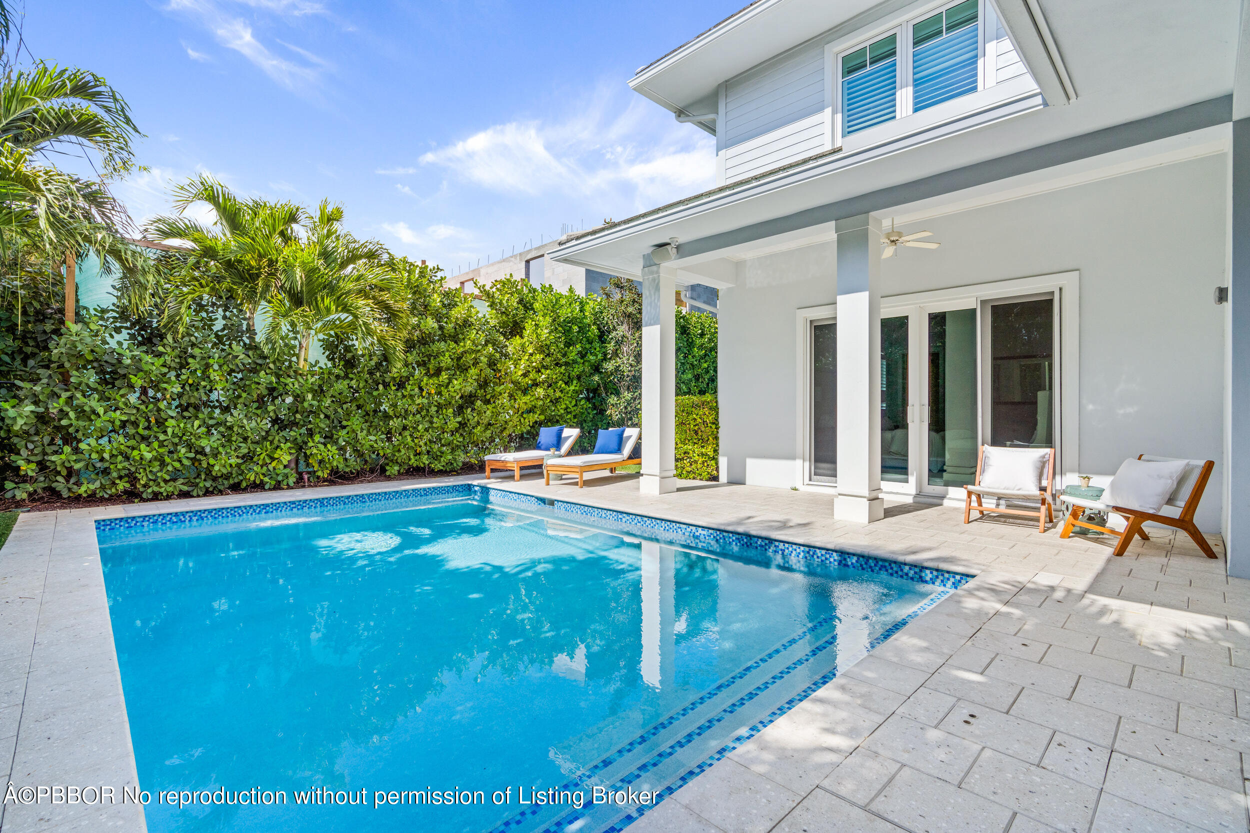 234 Desota Road West Palm Beach, FL 33405 - Photo 32 of 36 a swimming pool with outdoor seating and yard