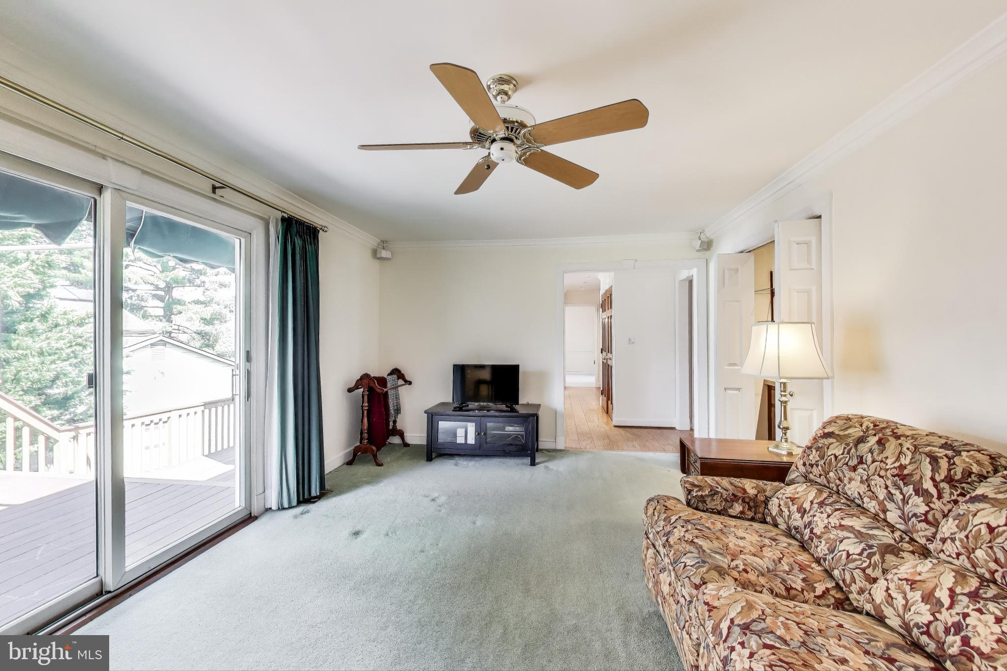 9201 Centerway Road Gaithersburg, MD 20879 - Photo 13 of 53 a living room with furniture and a large window