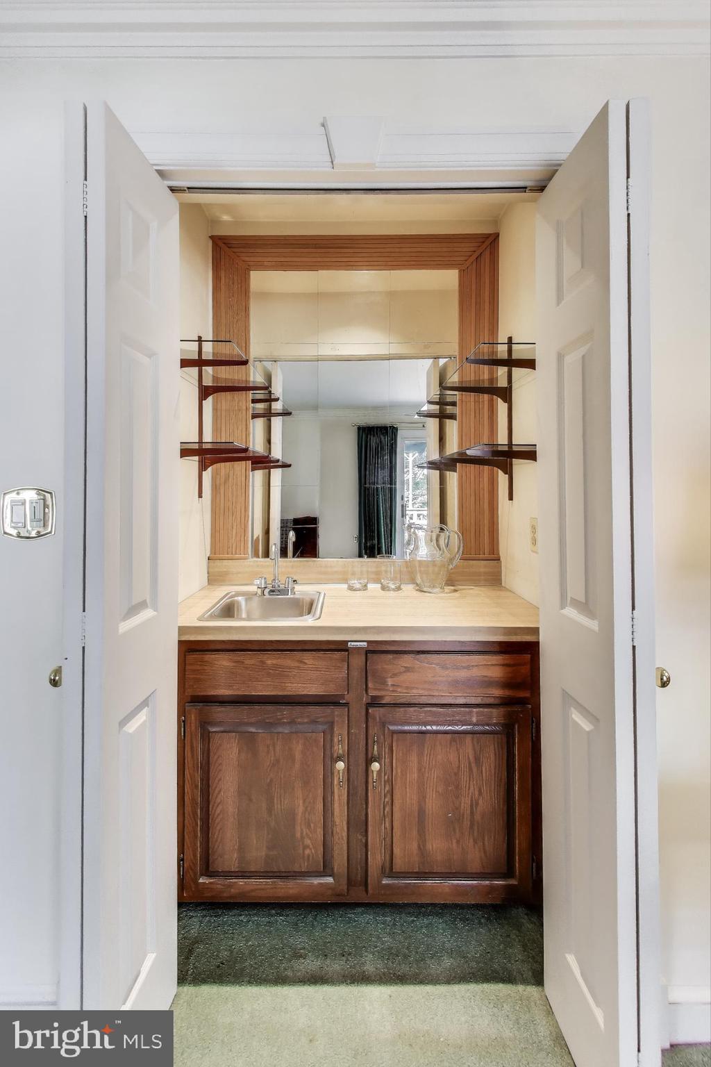 9201 Centerway Road Gaithersburg, MD 20879 - Photo 14 of 53 a view of living room with granite countertop furniture and fireplace