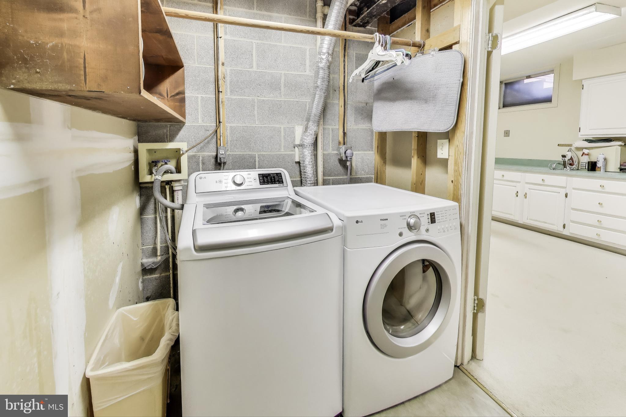 9201 Centerway Road Gaithersburg, MD 20879 - Photo 35 of 53 a utility room with dryer and washer
